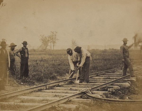 Military railroad operations in northern Virginia: African American laborers working on rail 1863