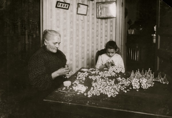 Mrs. Monte Mora, Fifty-five years old, is janitress for a large tenement, 133 W. Houston St., (lives Apt. 7) housing 26 families. When not tending the furnace or occupied with other duties for others ...