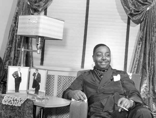 Prosperous Chicagoan spends evening at home. Chicago, Illinois 1941