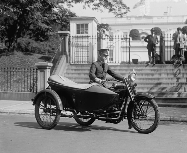 Sergeant Reiny a Policeman in a motorcycle with side car in front of the White House 1922