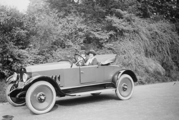 Two women in a Coupe - marked Young