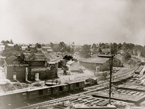 View of Atlanta, Georgia, with railroad cars in left foreground 1863
