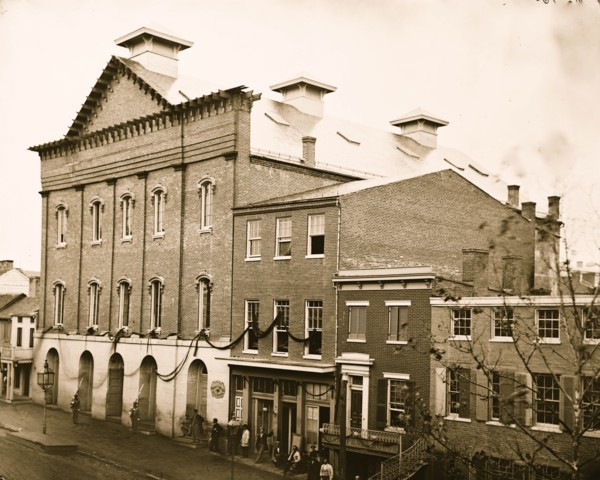 Washington, D.C. Ford's Theater with guards posted at entrance and crepe draped from windows 1865
