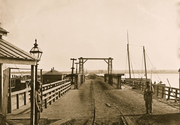 Washington, D.C. The Long Bridge over the Potomac seen from the city 1865