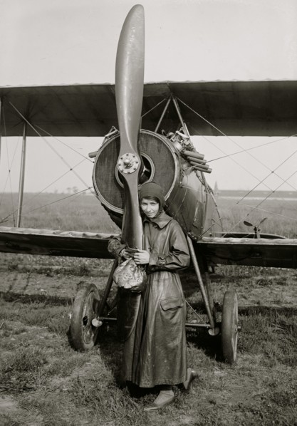 Woman hugs Plane Propeller