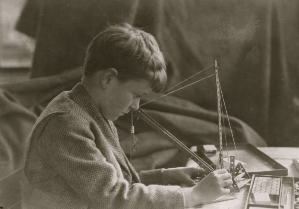 Young Boy with a Mechanical Toy 1924