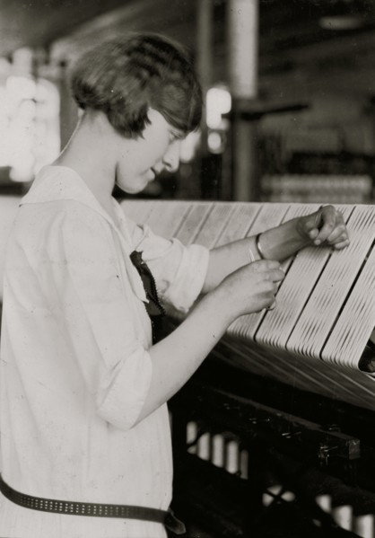 Young Girl woks on silk thread machine 1924