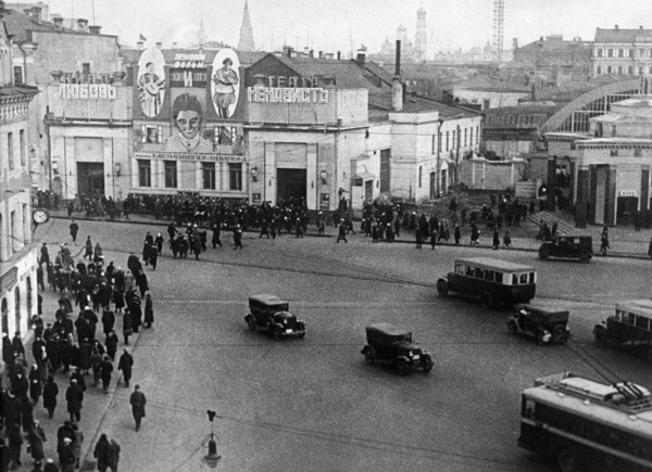 Moscow, 1936,  arbat square with a cinema showing 'lyubov' i nenavist'' (love and hate)  by a, endelstein.