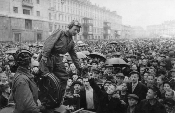 Victory parade in red square, moscow, ussr, june 24th, 1945, celebrating end of world war 2 in europe, moscow people greet soviet tank crew.