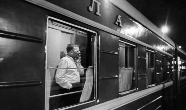 Soviet composer, dmitri shostakovich, on the train on his way home to moscow after the first performance of his 12th symphony 'the year 1917' by the leningrad philharmonic.