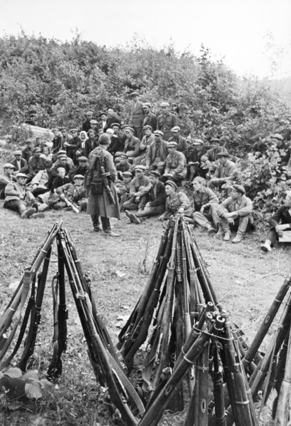 World war 2, commander of a russian partisan detachment explaining a mission to his men, september 1941.