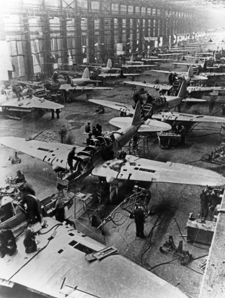 Il-2 sturmovik attack aircraft being built at a factory in the ussr during world war ll.