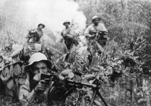 Tet offensive, south vietnamese plaf (people's liberation armed forces) soldiers firing on enemy troops in south vietnam, 1968.