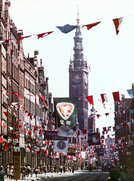 Street in gdansk, poland with the city hall clock tower in the background, 1965.