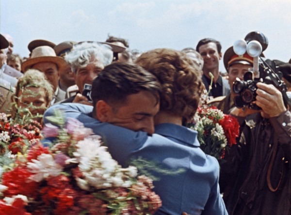 Soviet cosmonauts valentina tereshkova and valery bykovsky hug after bykovsky's flight in vostok 5, 1963.