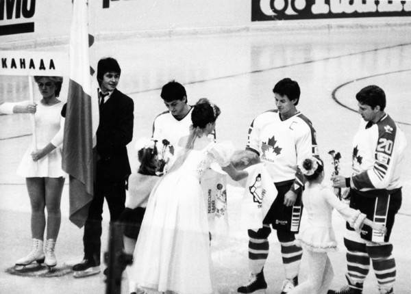 Traditional 'bread and salt' of hospitality being presented to the canadian ice hockey team during the opening ceremonies of the izvestia prize international ice hockey tournament on december 16, 1986...