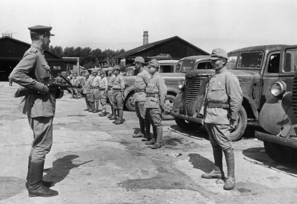 Operation august storm (battle of manchuria), a japanese transport column surrendering to soviet troops in harbin, manchuria, august 1945.