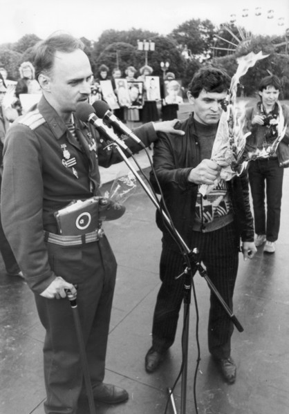 Major n, petrov, a veteran of the afghan war, and his friend burn an issue of the 'krasnaya zvezda' (red star) newspaper, the official organ of the ussr ministry of defense, in protest against the new...