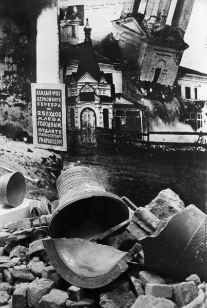 A display depicting the persecution of the church during the post-revolutionary period in russia, the poster reads 'every pound of church silver is worth 25 poods (old russian weight measure - aprox, ...