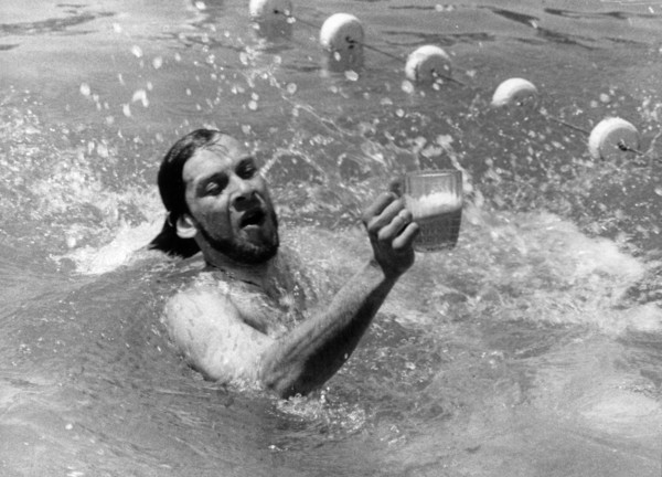 A member of the beer lovers' party preparing for the olympics, sochi, ruslla, july 1994.