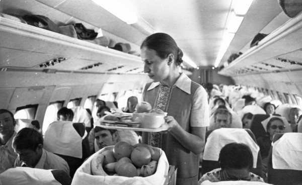 Pasengers being served during an aeroflot flight to tokyo, september 1973.