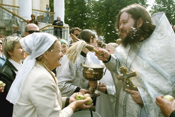 The transfiguration holiday celebrated by the russian orthodox church, orthodox priest gives blessing, moscow, russia, 2003.