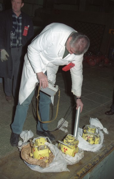 Yekaterinburg, russia, november 13, an expert seen measuring the radiation level of three containers which had been stolen at an enterprise in sverdlovsk region (the urals) by two criminals who were a...