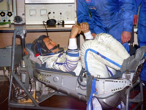 Kazakhstan, april 11, 2003, the flight engineer of the soyuztma-2 spacecraft edvard lu (c) is trying on his space suit during preparation for the flight at cosmodrome baikonur, the spaceship soyuztma-...