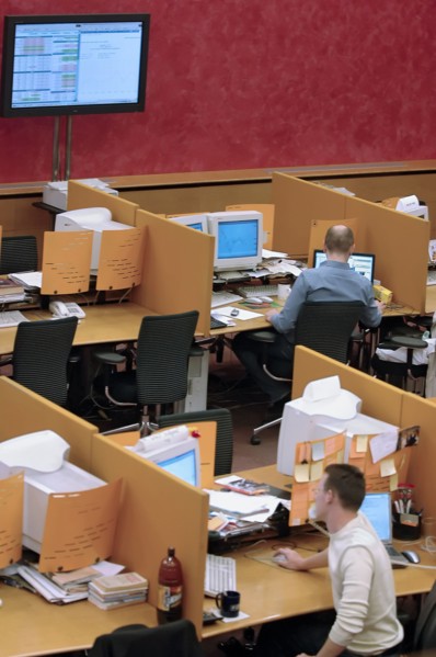Brokers are pictured at their computers in the trading room at the moscow interbank currency exchange (micex), moscow, russia, 2006.
