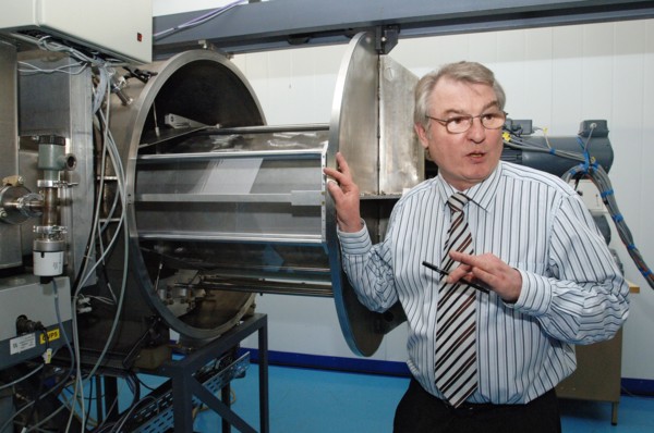 Academician yuri oganesyan, head of the flerov laboratory of nuclear reactions, standing near a track-etched membrane generator, recent research carried out at the flerov laboratory has confirmed the ...