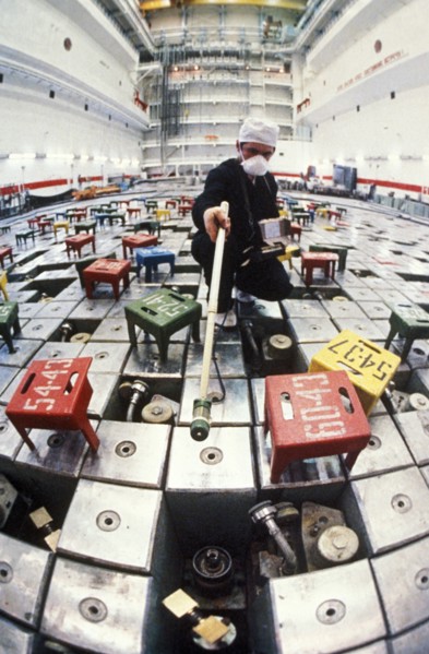 Technician in one of the reactors of the chernobyl nuclear power plant testing for high levels of radiation after the accident in april of 1986, may 1986.