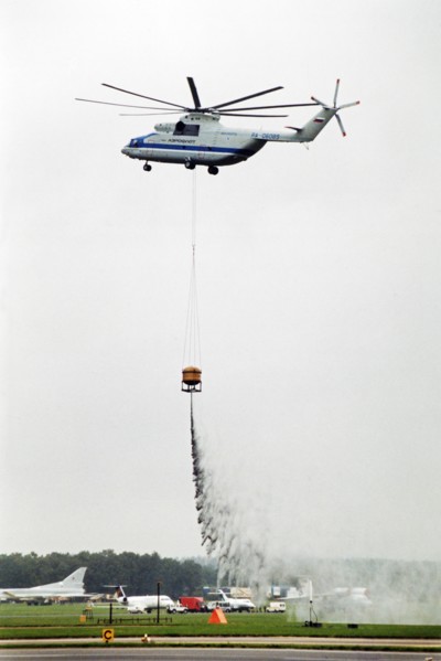 A russian mi-26 helicopter - the world's biggest - demonstrating it's fire-fighting capabilities at the farnborough air show in 1992.