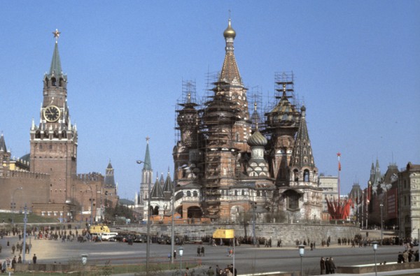 St, basil's cathedral under renovation in red square with the moscow kremlin on the left, 1980s.