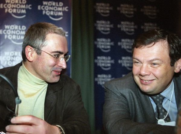 Chairman of the directors' board of the alpha-bank js mikhail fridman with khodorkovsky at the world economic forum.