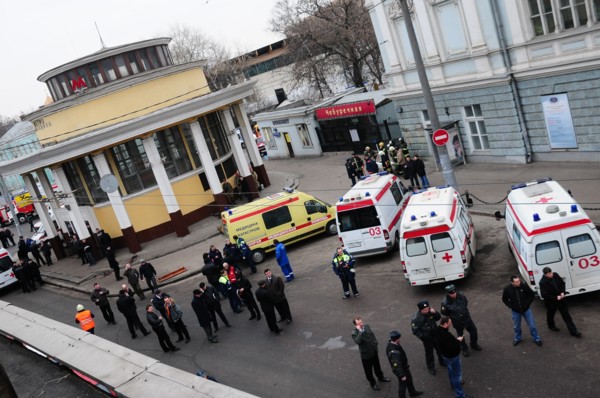Moscow, russia, march 29, 2010, ambulances and police officers at an entrance to park kultury metro station, sokolnicheskaya line of the moscow underground, an explosion rocked the metro station at 8,...