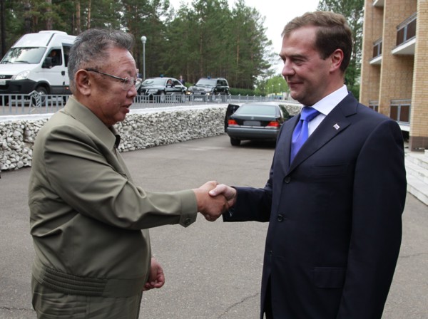 Ulan-ude, russia, august 24, 2011, russia's president dmitry medvedev (r) welcomes kim jong-il (kim jong il), the leader of the democratic people's republic of korea (north korea), the chairman of the...