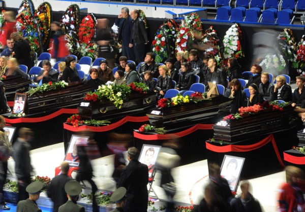 Yaroslavl, russia, september 11, 2011,people paying their last respects to the lokomotiv ice hockey players killed in a plane crash on september 7.