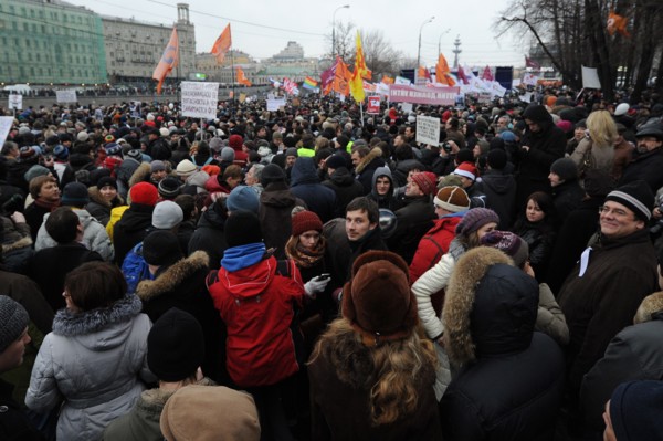 Moscow, russia, december 10, 2011, people attend an authorized rally 'for honest elections' in moscow's bolotnaya square to protest against electoral fraud at recent elections to the state duma.