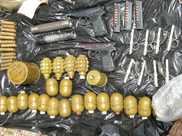 Part of a weapons and ammunition cache uncovered in the chita region of russia, may 29, 2007.