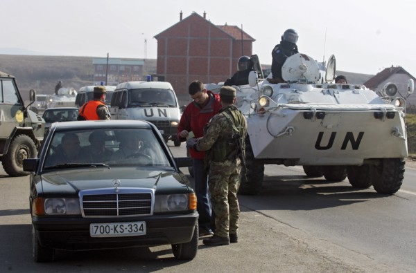 Vehicles at the crossing point in surroundings of pristina, the capital of kosovo, february 25, 2008.