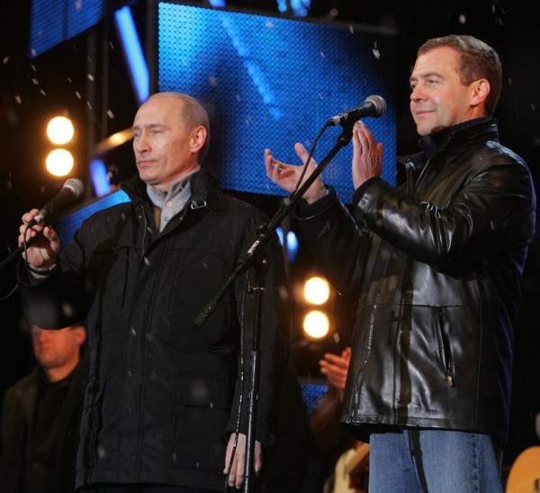 Moscow, russia, march 3, 2008, outgoing president vladimir putin (l) and first deputy prime minister dmitry medvedev address the audience during a concert in vasilyevsky spusk off red square, marking ...