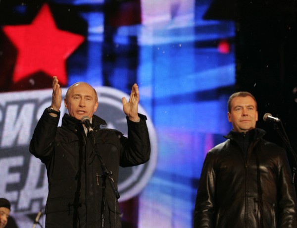 Moscow, russia, march 2, 2008, outgoing president vladimir putin (l) and first deputy prime minister dmitry medvedev address the audience during a concert in vasilyevsky spusk off red square, marking ...