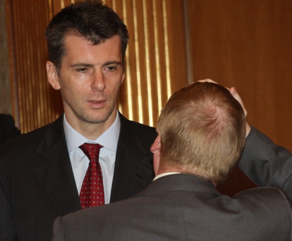 Moscow, russia, october 16, chairman of the board of polyus gold company, onexim group's owner mikhail prokhorov (background) attends a meeting of the organising committee to prepare for the nanotechn...