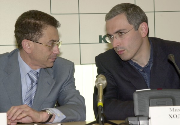 Moscow, russia, june 18, 2003, new chairman of the directors' board of the yukos oil company semen kukes (l) and chairman of the directors' board of the yukos- moscow company mikhail khodorkovsky pict...