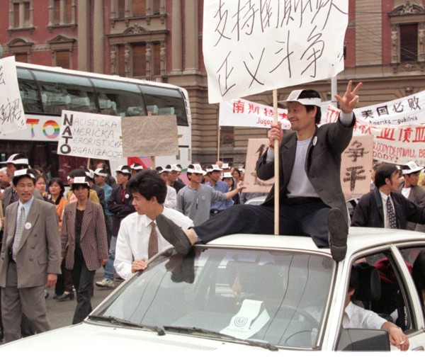 Belgrade,yugoslavia, may 9 2001, in response to the bombing of the chinese embassy in belgrade, about 200 young chinese rally in downtown belgrade on sunday demanding to end the nato`s bombing of yugo...