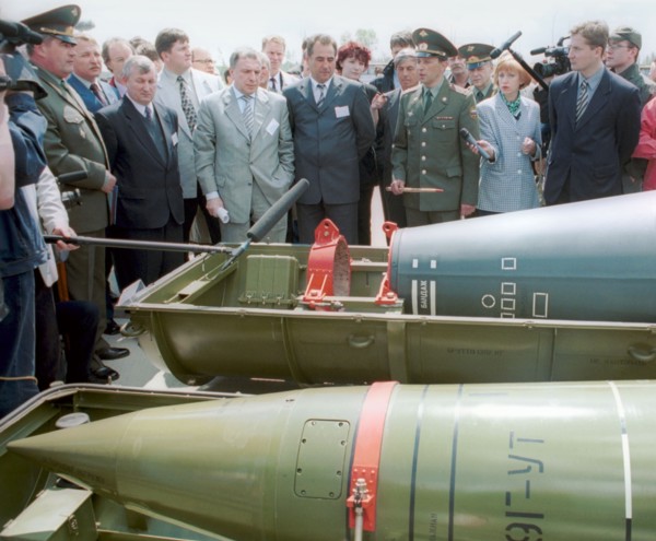 Kurgan region, june 9 2001: members of the russian governmental delegation, headed by vice-premier ilya klebanov (center), and foreign specialists viewing missile warheads, filled with chemical agents...
