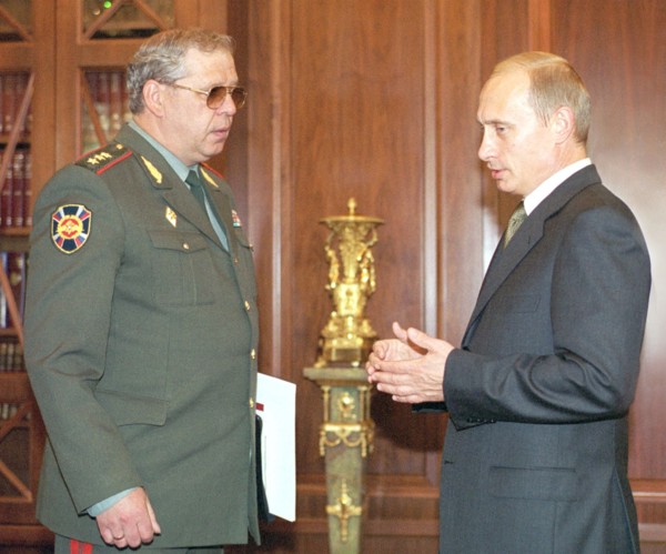 President vladimir putin (r) and director of the russian federal borderguard service konstantin totsky (l) during their meeting in the kremlin today,head of service reported president on the situation...