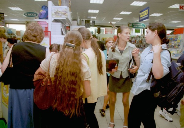 Moscow high school students shopping in a school supply store on new arbat street, moscow, 2002.