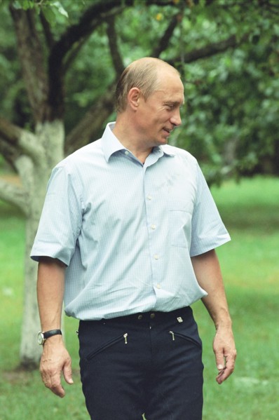 Russian president vladimir putin strolling in presidetnial residence novo-ogaryovo in july 2002.