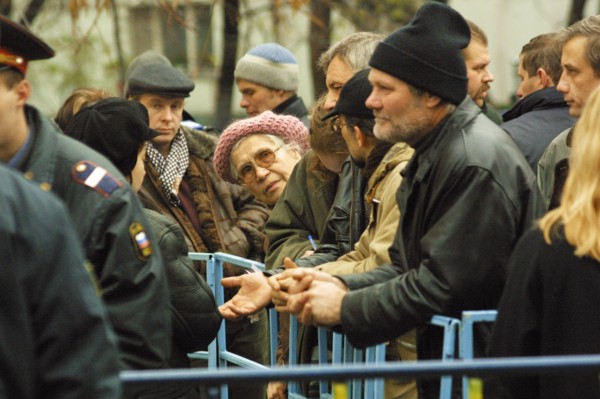 Moscow, russia,10/26/02: chechen hostage crisis: relatives of freed hostages take part in compiling list of names for passes into hospitals .